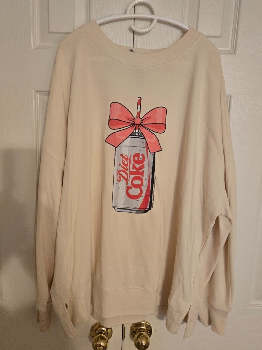 Cream Crewneck Sweater with Pink Bow and Soda Can Graphic